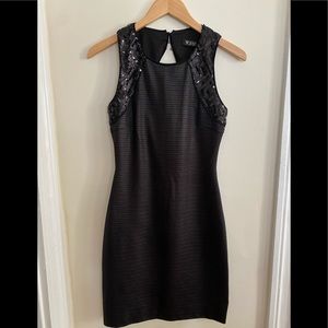Guess charcoal gray/sequined mini dress. Size 4. Worn once. Slight open back.
